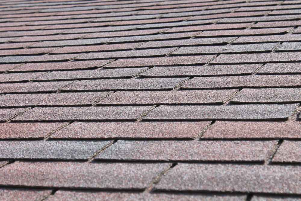 matching asphalt roofing to home in Atlanta